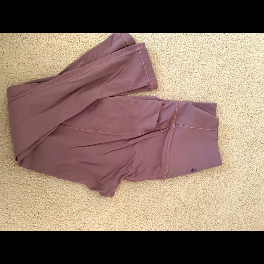 New style Athleta salutation stash pocket in mineral brown-